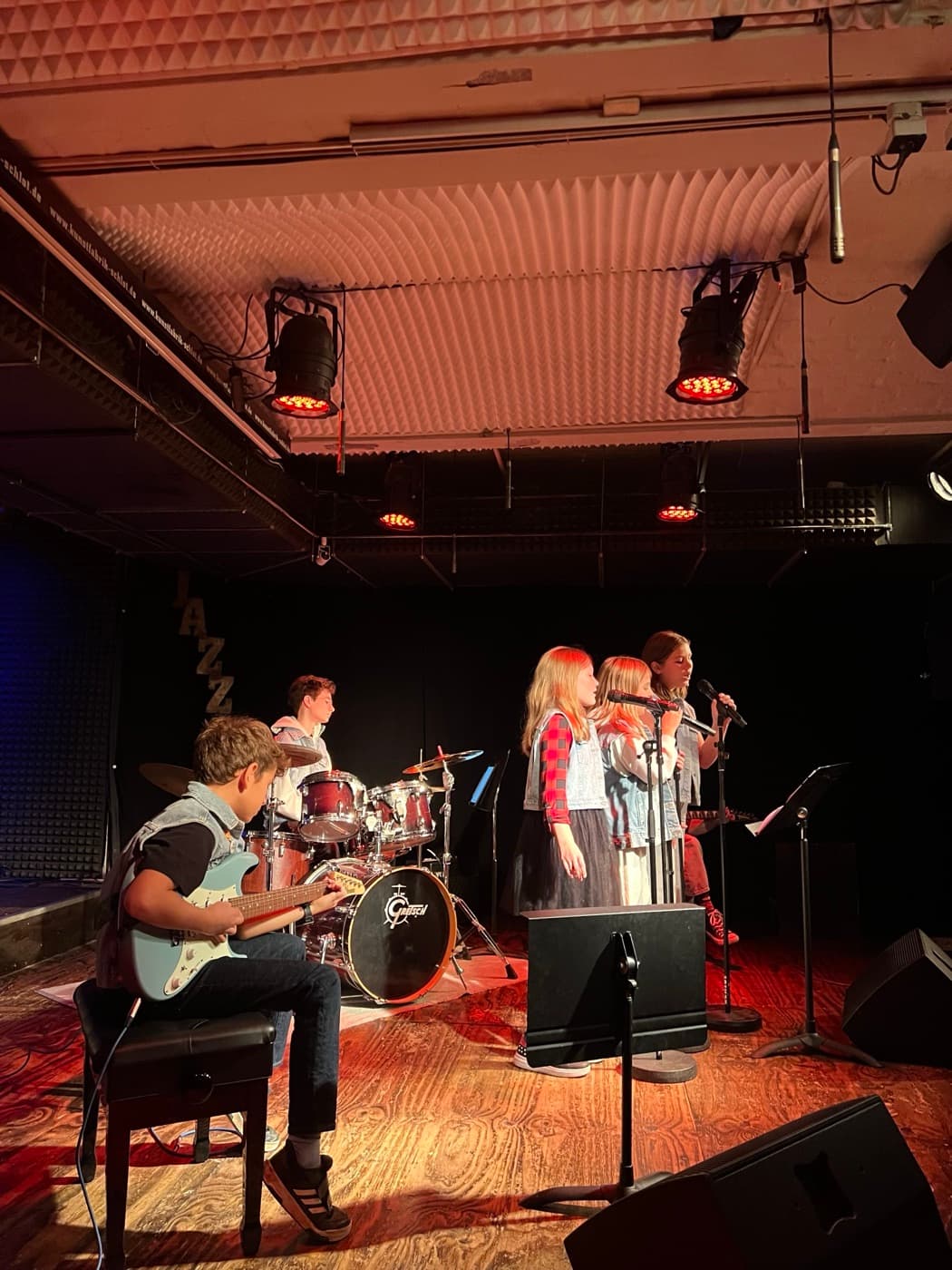 Kids band performing live on stage